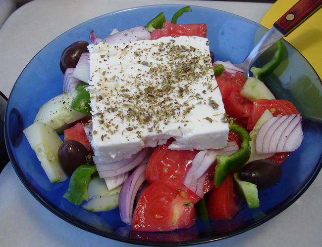 Xoriatiki salad with cucumbers, tomaotes, feta, and olives.