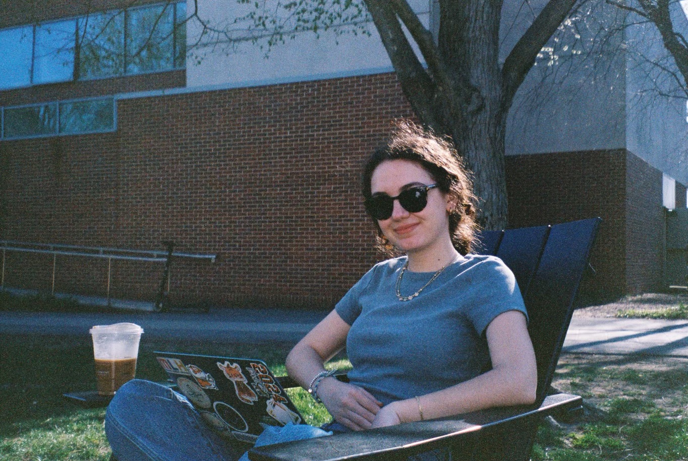 Mary in front of Music building.